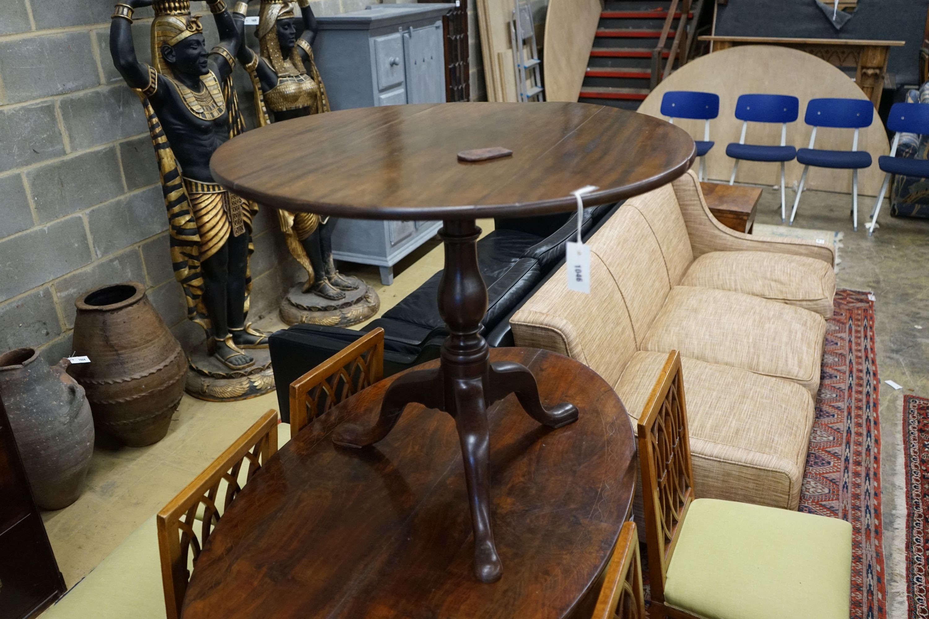 A George III circular tilt top tripod tea table, diameter 86cm, height 72cm